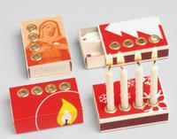 Candles with advertising matchbox